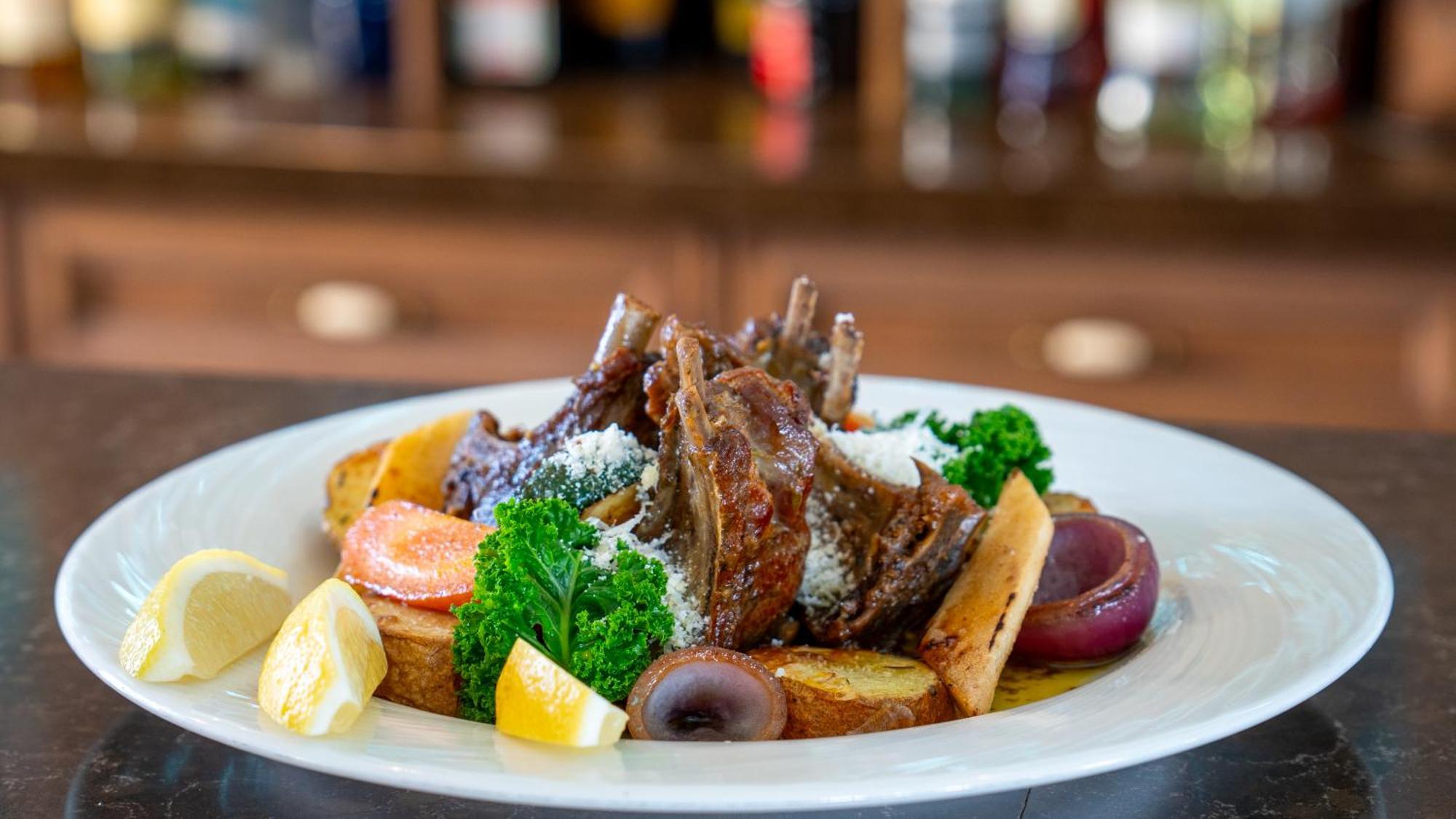 Boutique Odyseja & Spa Ciechocinek Buitenkant foto A plate of grilled lamb chops