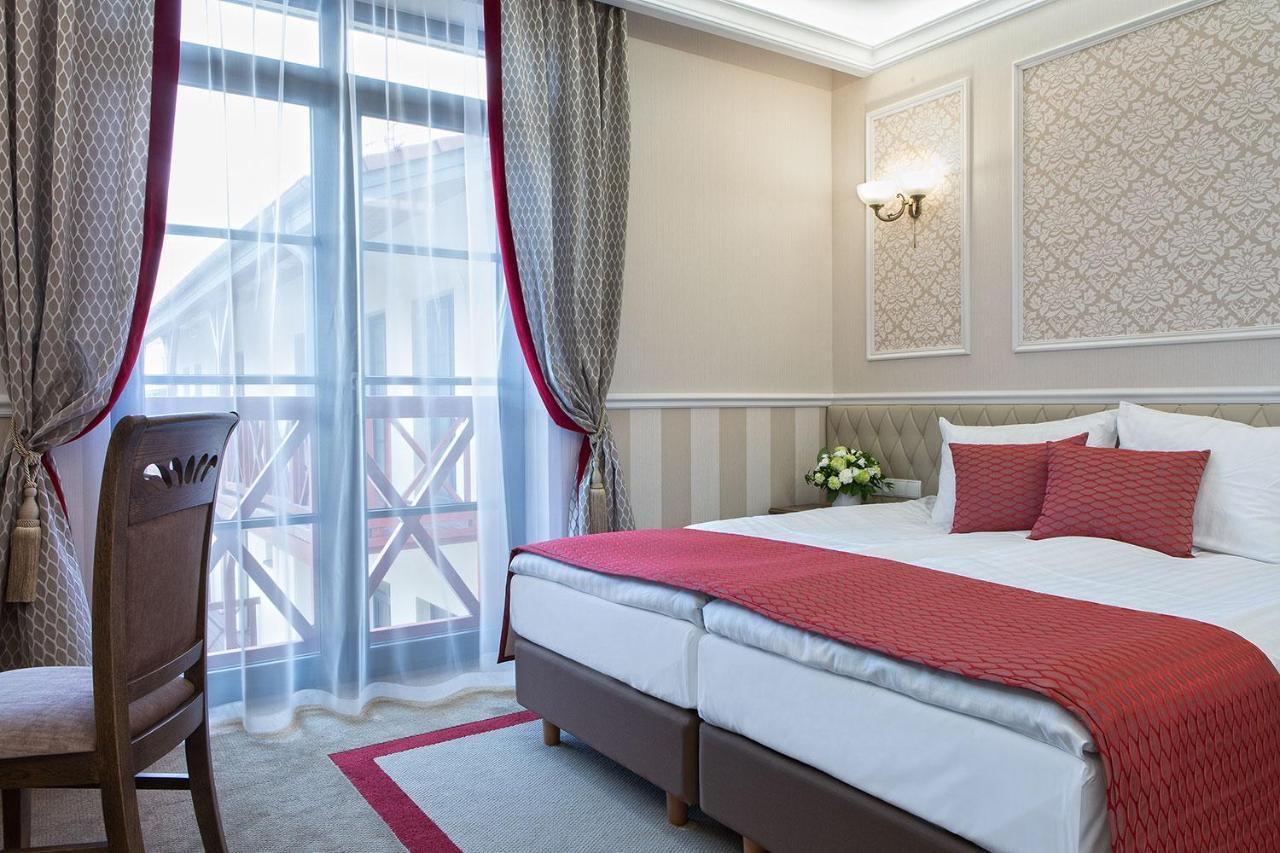 Boutique Odyseja & Spa Ciechocinek Buitenkant foto A room at the hotel