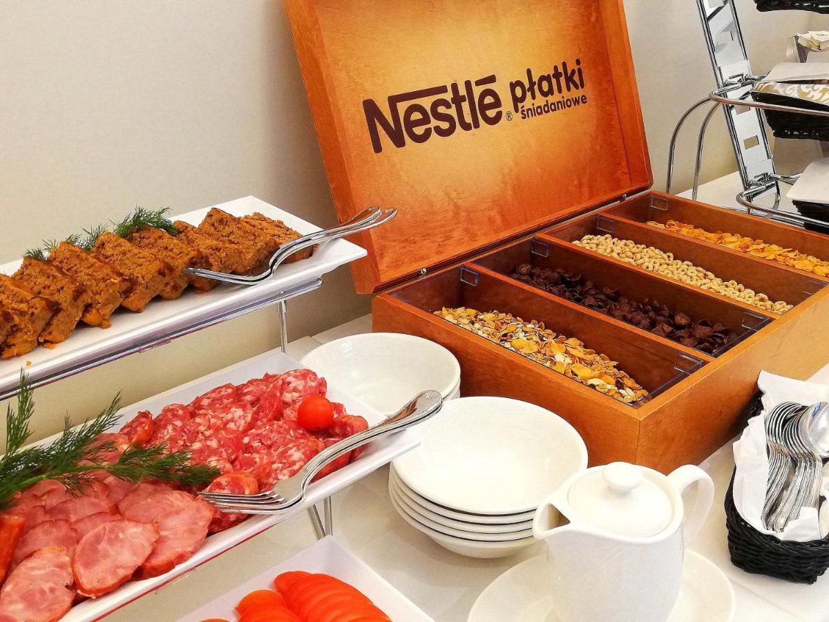 Boutique Odyseja & Spa Ciechocinek Buitenkant foto Nestlé breakfast