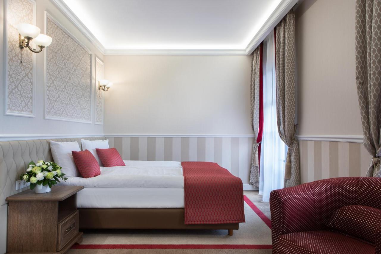 Boutique Odyseja & Spa Ciechocinek Buitenkant foto A room at the hotel